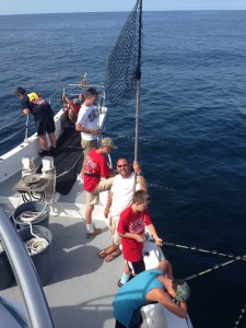 Men and young boys fishing on Ocean City charter boat
